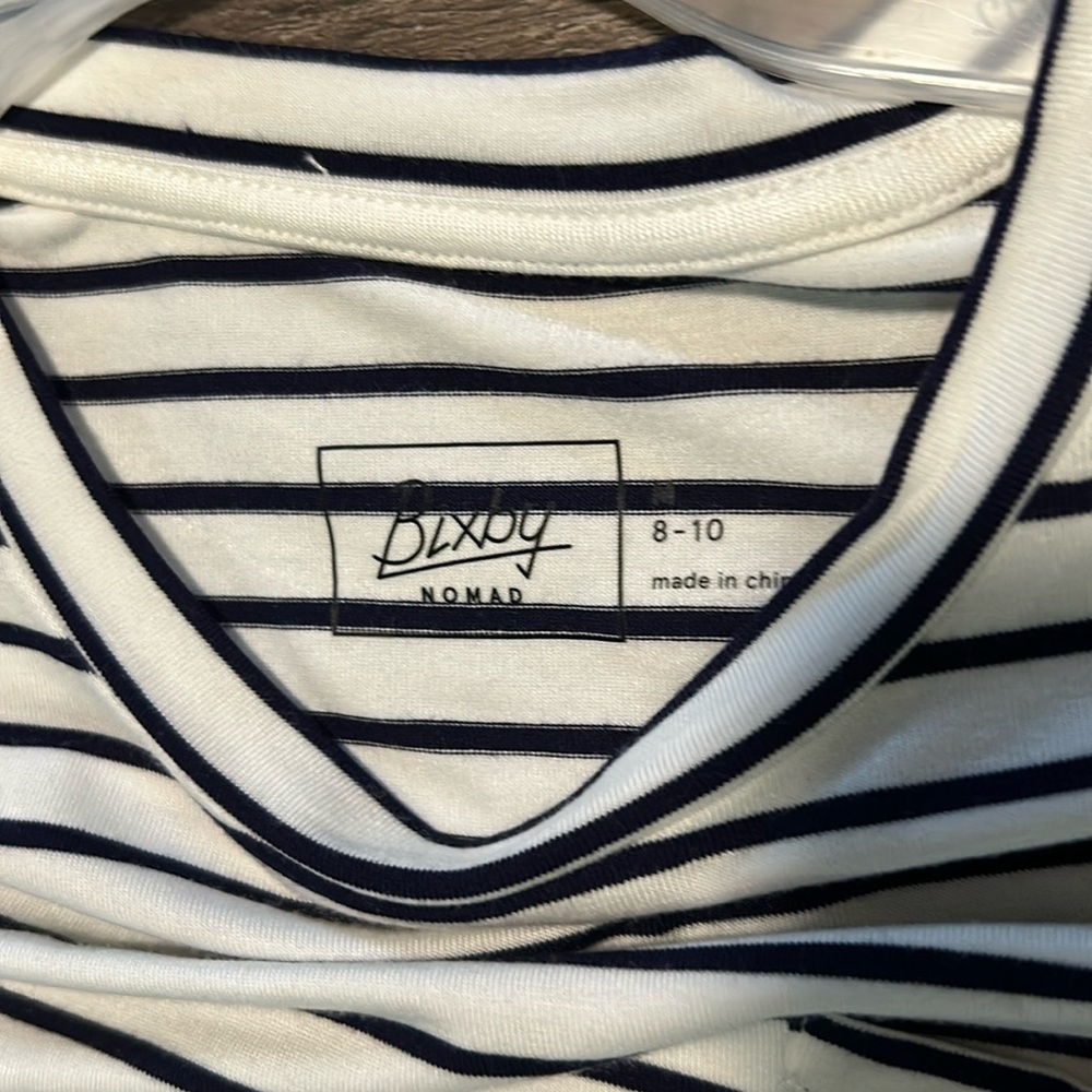 New Bixby nomad name. Size 8-10 pocket tee